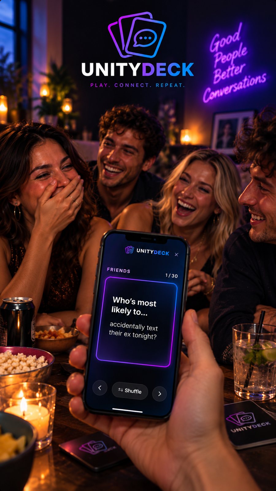 Friends laughing around a table while one of them holds up a phone showing a UnityDeck card